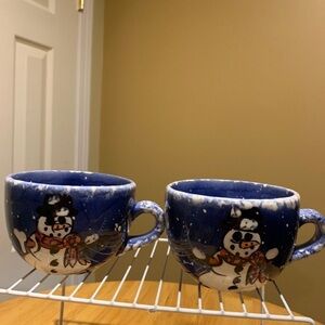 Two Debra Kelly Holiday Coffee Mugs
